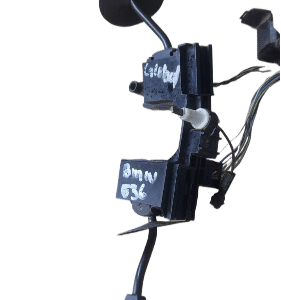 Front-angle view of a BMW E36 combination switch stalk showing control levers and connectors.Front-angle view