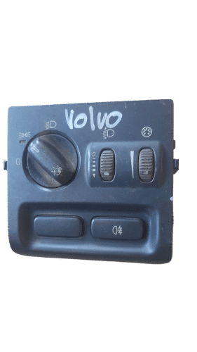 Volvo Headlight Switch Front-facing view of a Volvo car headlight switch with illuminated orange indicators and black housing.Front-f