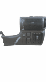 Front view of a black headlight switch and cover for a 1995 Opel Kadette displayed on white background.Front v