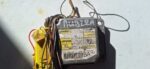 Front view of Daewoo Nubira airbag control unit with wiring connector, clean and intact condition.Front view o