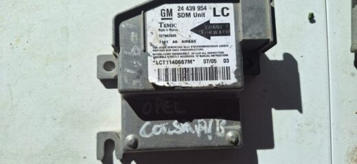 Opel Corsa C airbag control module shown from the top, electrical connectors visible, used condition not state