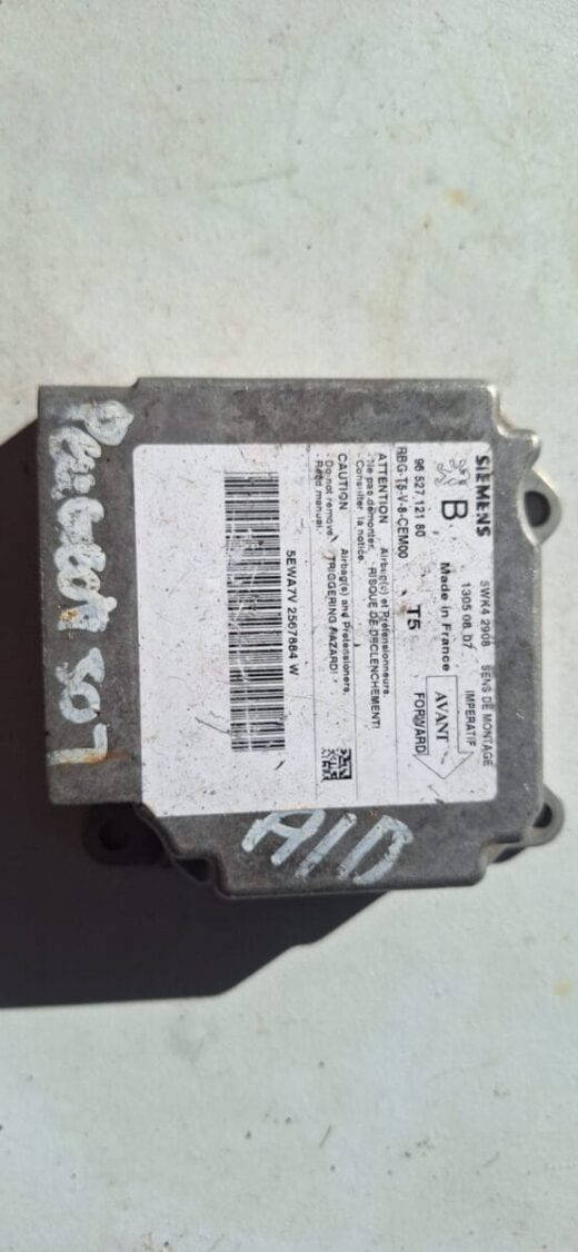 Front view of a Peugeot 307 airbag module showing wiring and connectors, clean and intact.Front view of a Peug