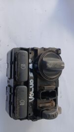 Used fog light and headlight switch assembly for Volvo XC90, viewed from front angle.Used fog light and headli