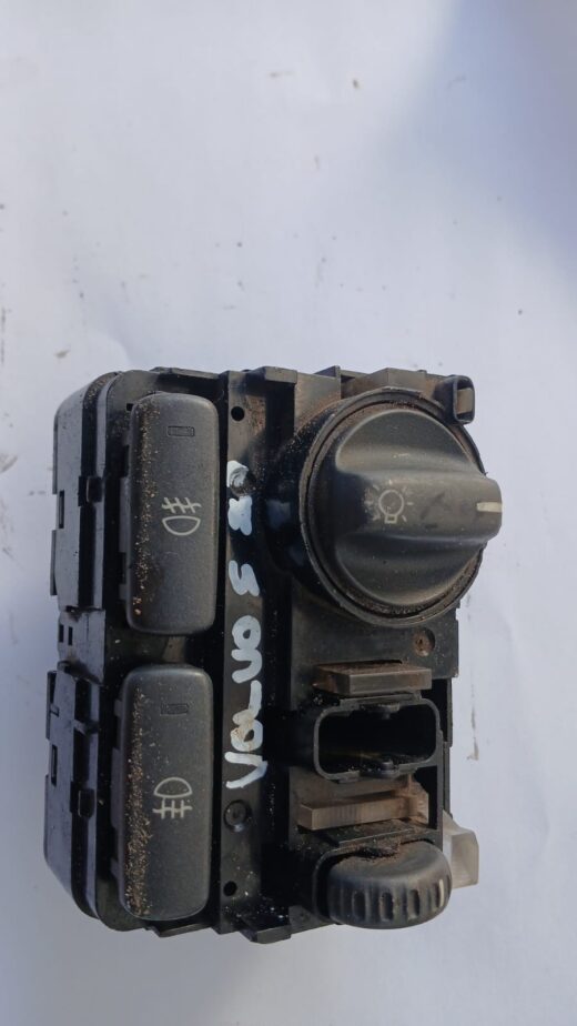 Used fog light and headlight switch assembly for Volvo XC90, viewed from front angle.Used fog light and headli
