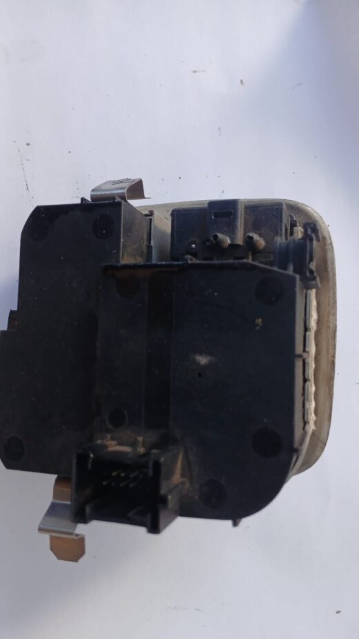 Used Mercedes W203 headlight switch shown from front angle with control knobs and connector visible.Used Merce