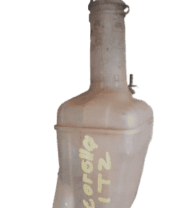 Front angled view of a used washer bottle for a Toyota Corolla showing connector and mounting points.Front ang
