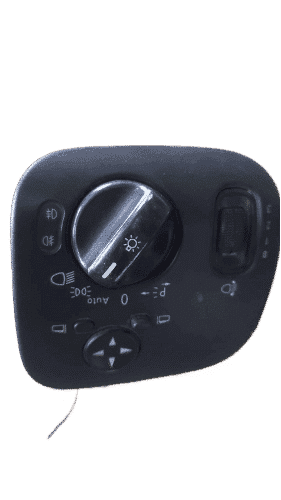 Mercedes W203 Headlight Switch Front view of a used Mercedes W203 car headlight switch with circular knob and wiring connector.Front view of