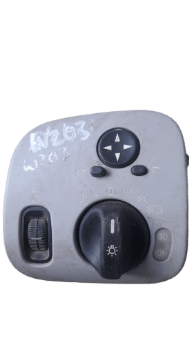 Mercedes W203 Headlight Switch Front view of a car headlight switch with control knob and dial, shown as main featured image.Front view of a