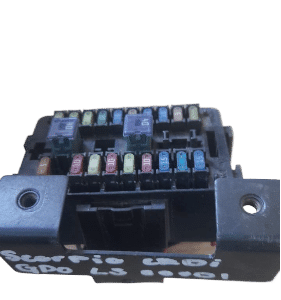Front view of a new fusebox for a Mahindra Scorpio showing top and side connectors.Front view of a new fusebox