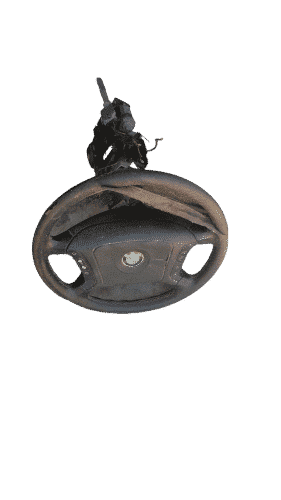 Whatsapp Image 2024-01-03 At 12.12.58 (4)-Fotor-Bg-Remover-2024010316017 Front view of BMW E39 steering airbag module showing center cover and mounting points.Front view of BMW E39 st