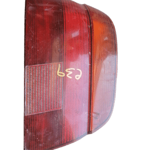 Left rear taillight for BMW E39 528, shown from exterior side, clean and undamaged.Left rear taillight for BMW