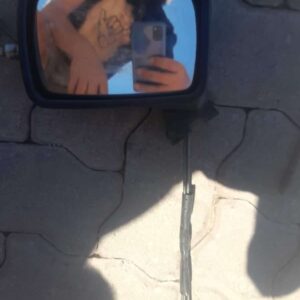 Left side door mirror for VW Golf 1, used, shown from front angle on white background.Left side door mirror fo