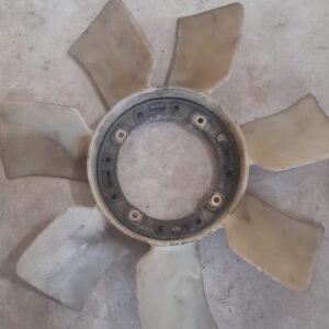 Front angled view of a new black radiator cooling fan blade with multiple curved blades.Front angled view of a