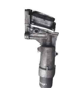 Front-angle view of a clean Mercedes W210 E320 engine oil cooler with metal fittings and cooling fins.Front-an