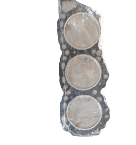 Top-down view of a new 3-cylinder engine gasket showing metal and composite layered surfaces.Top-down view of