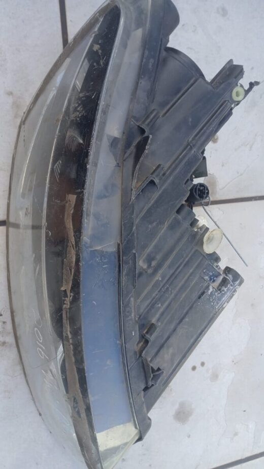 VW Polo 6 Right Headlight Bracket – Used Sold As Is – side angle