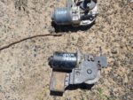 Front angle view of a used Mercedes A160 windshield wiper motor with wiring and mounting points visible.Front