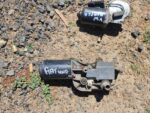 Used wiper motor for Fiat Uno showing front and side view with mounting points visible.Used wiper motor for Fi
