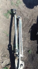 Used Ford Focus wiper motor shown from the front with attached wiring and mounting points visible.Used Ford Fo