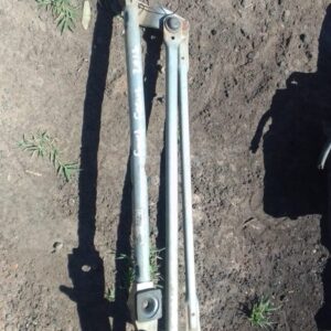 Used Ford Focus wiper motor shown from the front with attached wiring and mounting points visible.Used Ford Fo