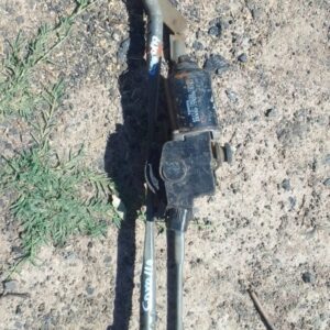 Front view of a used car wiper motor assembly for a 2006 Toyota Corolla showing mounting points and electrical