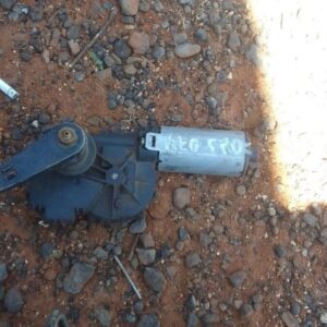Rear view of used Vito 115 rear wiper motor with attached wiring and mounting bracket visible.Rear view of use