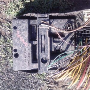 Used fuse box for Renault Scenic, front view showing terminal connectors and wiring slots.Used fuse box for Re