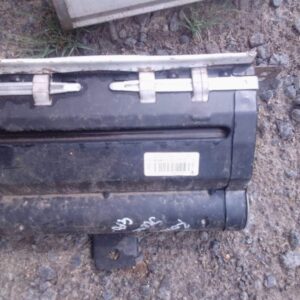 Front view of a used Renault Scenic dashboard airbag module showing intact airbag cover and mounting points.Fr
