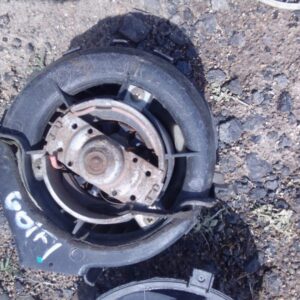 Used side view of a compact blower fan with mounting brackets and visible wiring harness.Used side view of a c