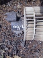Used car blower fan positioned front-facing showing mounting points and electrical connector details.Used car