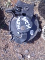 Front view of used blower fan for Mercedes W203 showing fan blades and casing.Front view of used blower fan fo