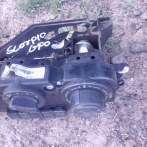 Front view of used Mahindra Scorpio climate control panel showing buttons and dials for car AC settings.Front