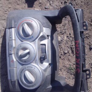 Dashboard climate control panel for Daihatsu Sirion, front view, used condition.Dashboard climate control pane