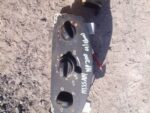 Climate control unit for Nissan NP200 shown from front, used condition visible in clean setup.Climate control