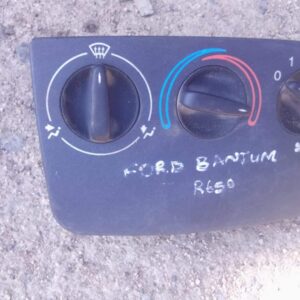 Front view of used Ford Bantam dashboard climate control unit with buttons and dials intact.Front view of used