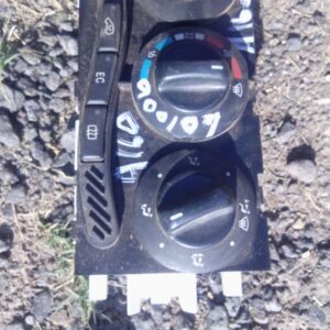 Front view of used climate control unit for Mercedes Benz A160 showing buttons and display.Front view of used