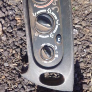 Front view of used climate control unit for Renault Scenic showing buttons and dial panel.Front view of used c