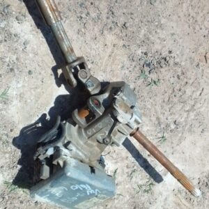 Front view of a used Volkswagen Polo electric steering column with wiring and connectors attached.Front view o