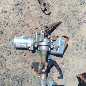 Used electric steering column for Nissan Micra, front angle view showing wiring and mounting points.Used elect