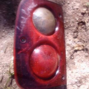 Right taillight for Land Rover Freelander shown from outside rear angle, used condition.Right taillight for La