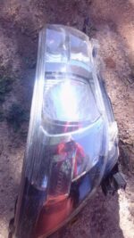 Right side used headlight for 2014 Toyota Hilux, clear lens with integrated turn signal visible.Right side use