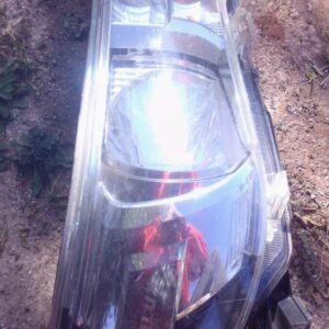 Right side used headlight for 2014 Toyota Hilux, clear lens with integrated turn signal visible.Right side use