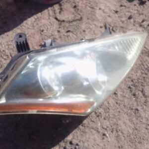 Right side headlight for Nissan Murano, used condition, shown from front angle.Right side headlight for Nissan