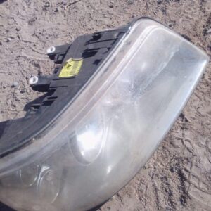 Right-side used headlight for Volkswagen Crafter, shown front angle.Right-side used headlight for Volkswagen C