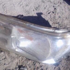 Left front headlight assembly for Toyota Hilux GD6, used condition, shown from front angle.Left front headligh