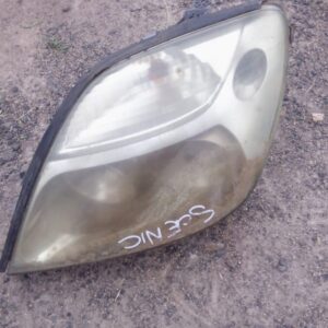 Left side used headlight for a Renault Scenic, showing front and side lens and connector details.Left side use