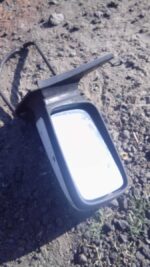 Right side mirror for Ford Sierra shown from front angle, used condition, featuring black housing and attachme