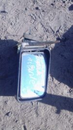 Right side car mirror for a Toyota Avante, shown from front angle, used condition.Right side car mirror for a
