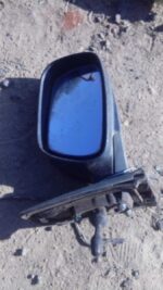 Right side exterior mirror for Lexus IS200 in used condition, shown from front angle.Right side exterior mirro