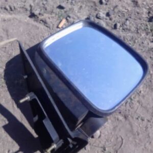 Right side used car door mirror shown from a slightly angled front view on a white background.Right side used